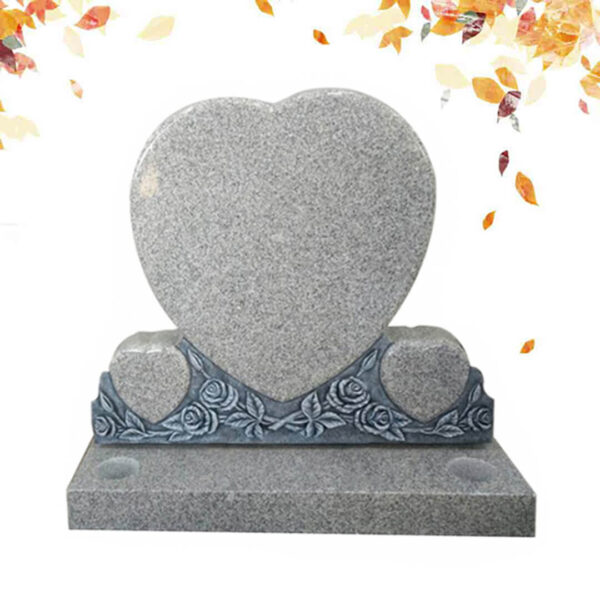 Three heart shape gray tombstones