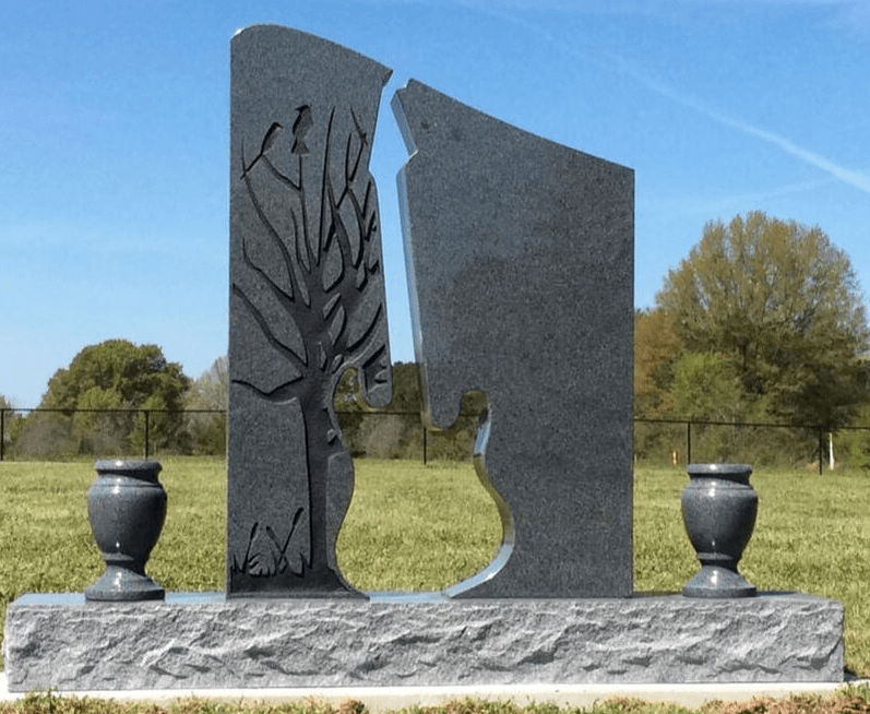 granite guita shape headstone