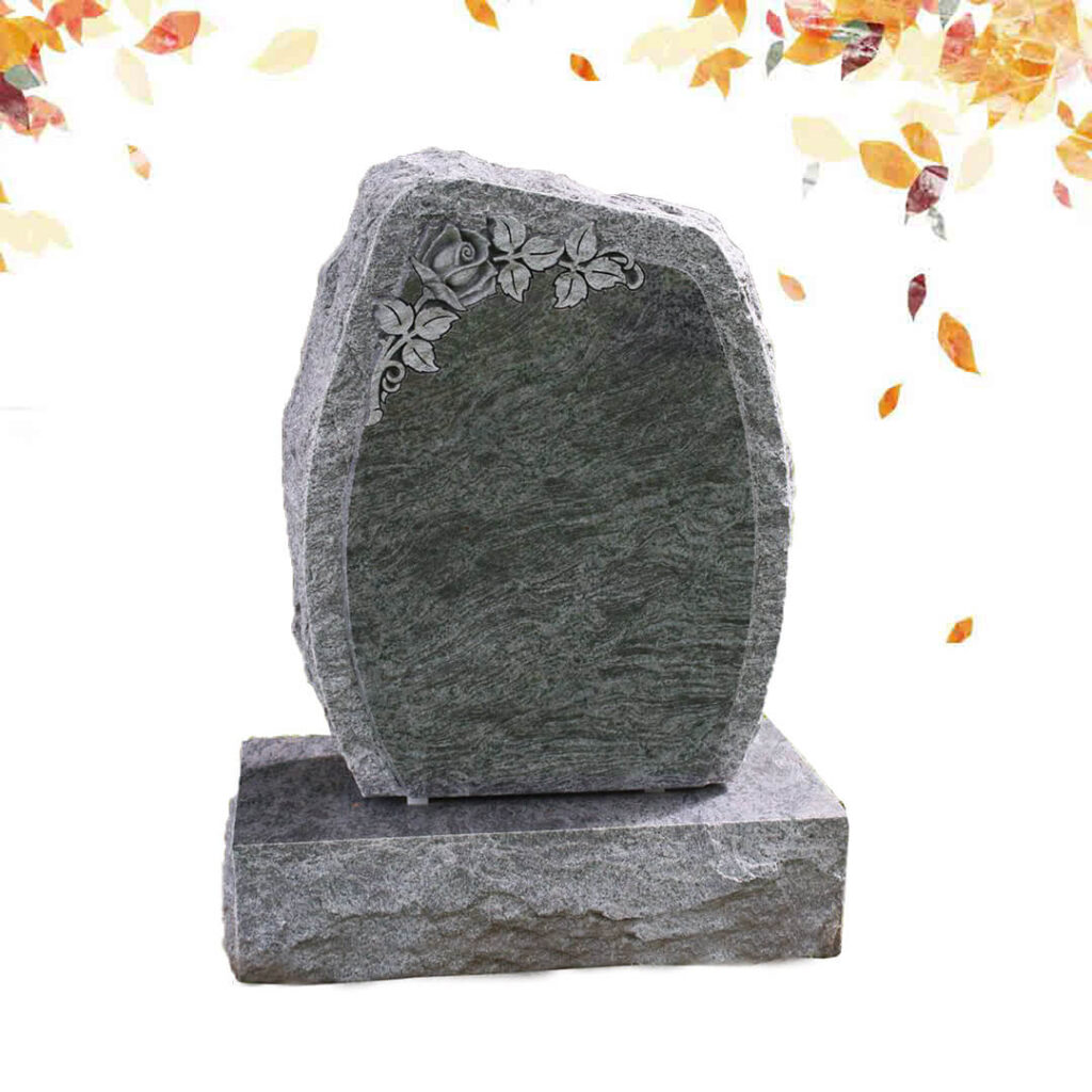 Upright granite headstone with flower engraving