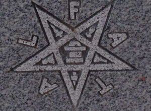upside down star mean on a grave